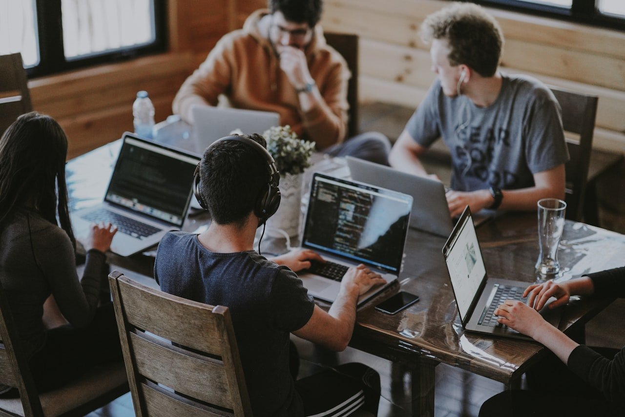Professional development team collaborating in a modern workspace
